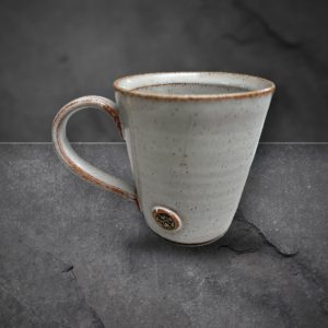 Stoneware mug with the Patterdale Mountain Rescue Team badge